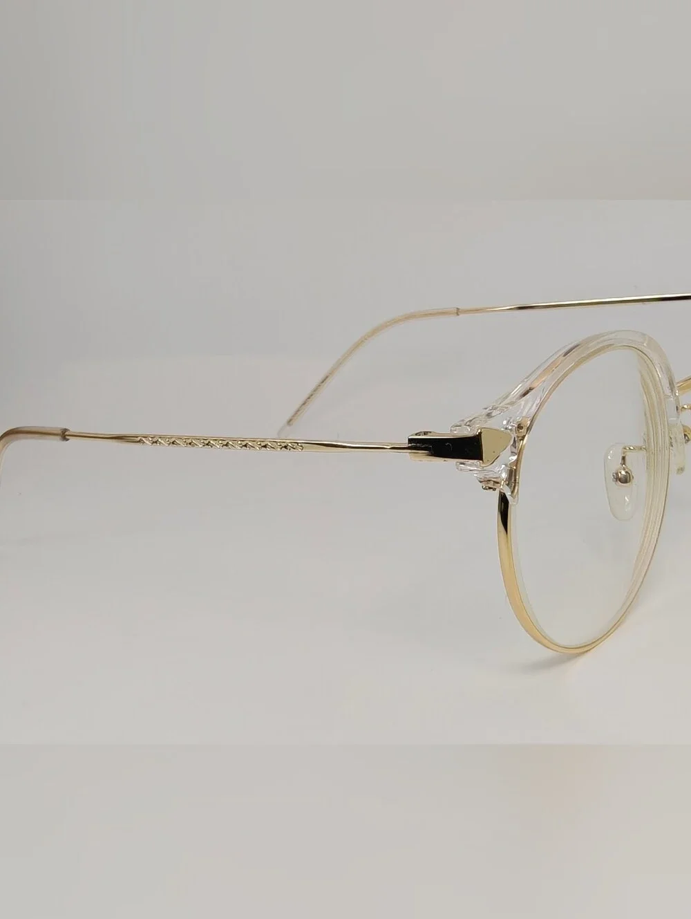 Moon River. Elegant. Round Gold Metal Frame Glasses. Details.